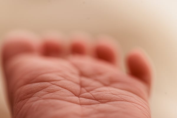 Extreme close-up of the sole of a newborn's foot